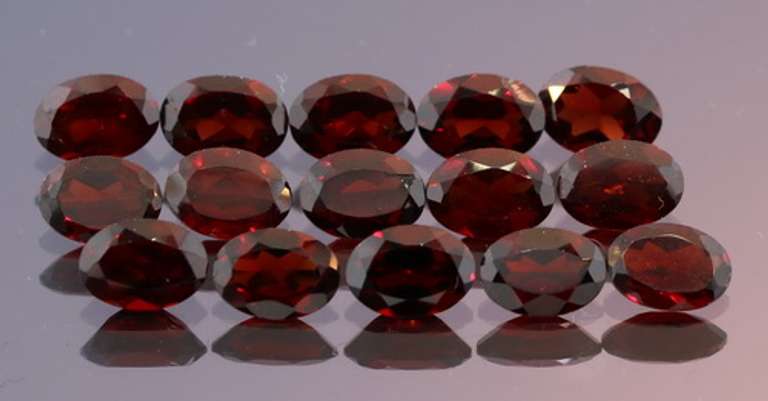 Incredible 13.59ct open color VS Garnet set