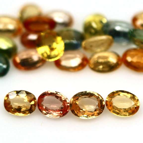 Glittering 6.73ct fancy color Sapphire set