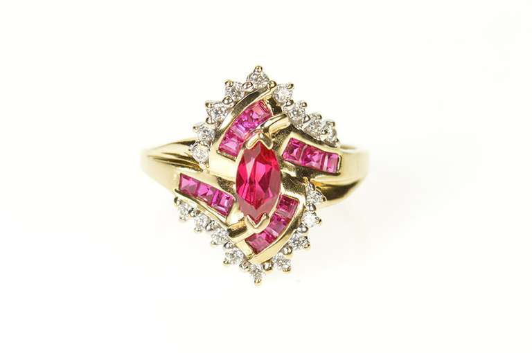 10K Yellow Gold Marquise Syn. Ruby Cubic Zirconia Halo Bypass Ring