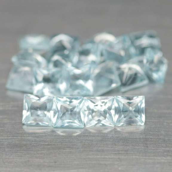 Amazing 5.10ct radiant cut ice blue Topaz set