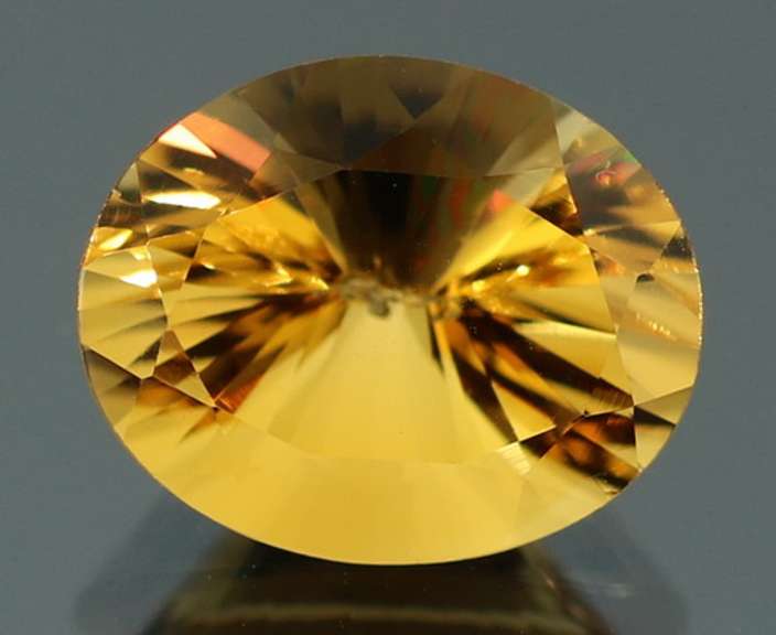 Vibrant 3.38ct 9x11mm concave cut Citrine
