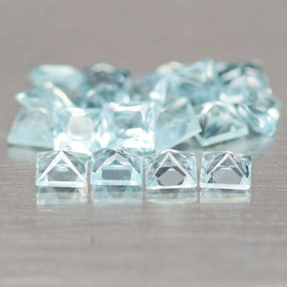 Amazing 5.10ct radiant cut ice blue Topaz set