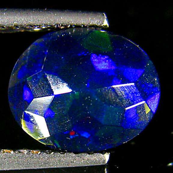 Silky black 1.44ct faceted Welo Black Opal