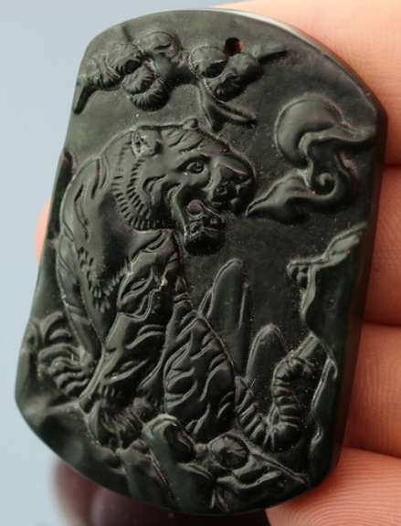Huge! 85.77ct blackish green Jade carving
