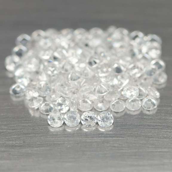 Heavy! 16.58ct diamond white Zircon set