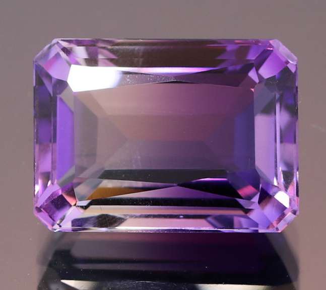 Beautiful 19.49ct top color created Ametrine