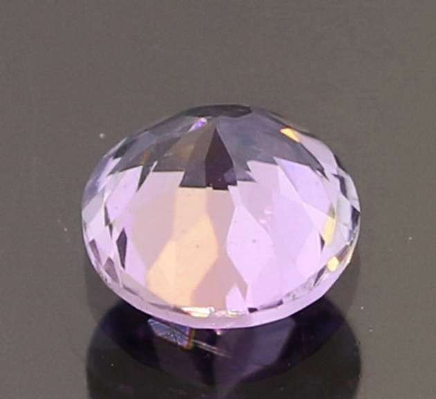 Rare! .71ct unheated real pink Tanzanite solitaire