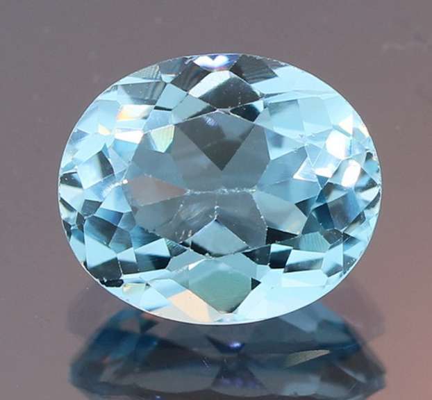 Brilliant 5.76ct oval cut Topaz center stone