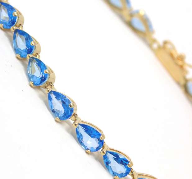 Gorgeous Pear Blue Topaz Line Yellow Gold Bracelet