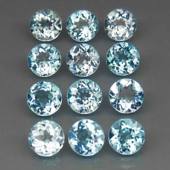 High fire collection of 12.21ct Topaz solitaires