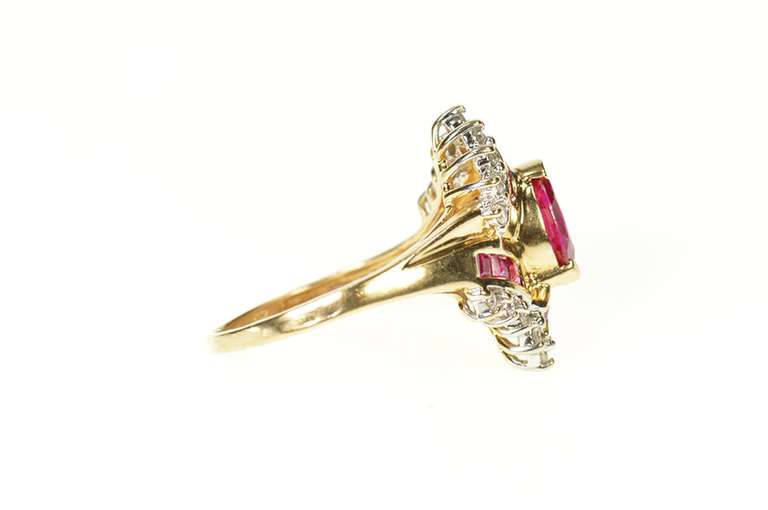 10K Yellow Gold Marquise Syn. Ruby Cubic Zirconia Halo Bypass Ring