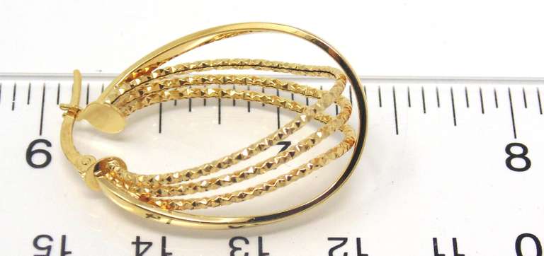 Trendy 14kt Yellow Gold Diamond Cut Interlocking Hoop Earrings