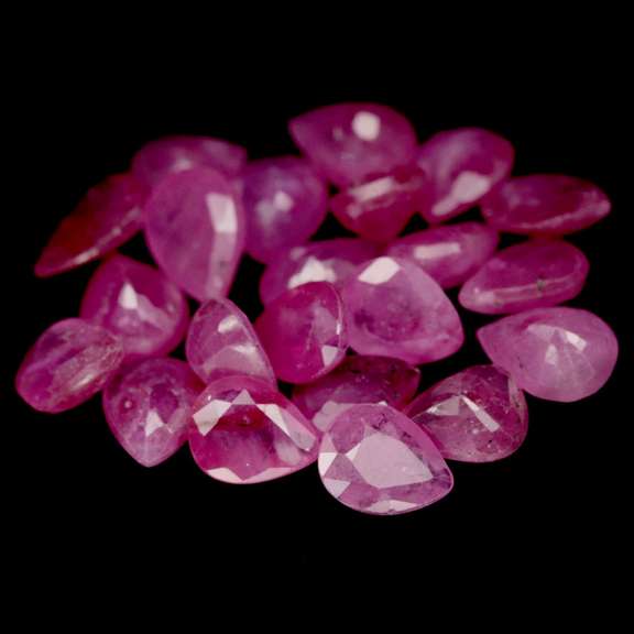 Heated only! 7.83ct reddish pink Ruby set