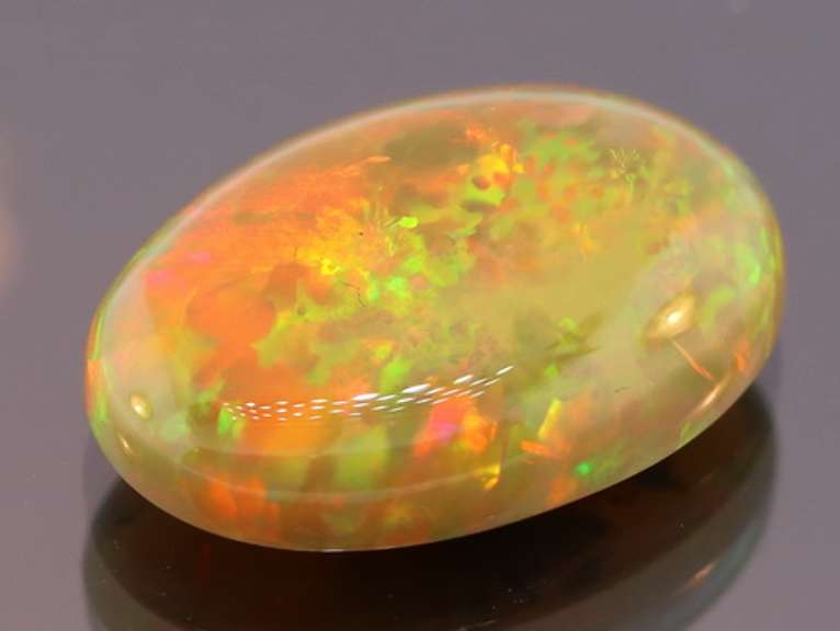 Magnificent 4.58ct full body flashing Semi Black Opal