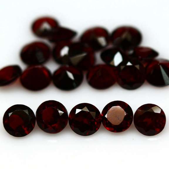 Rich round cut 8.86ct Garnet set