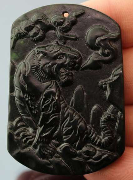 Huge! 85.77ct blackish green Jade carving