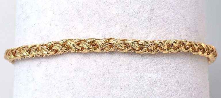 Elegant Braided Bracelet in 14KT Yellow Gold