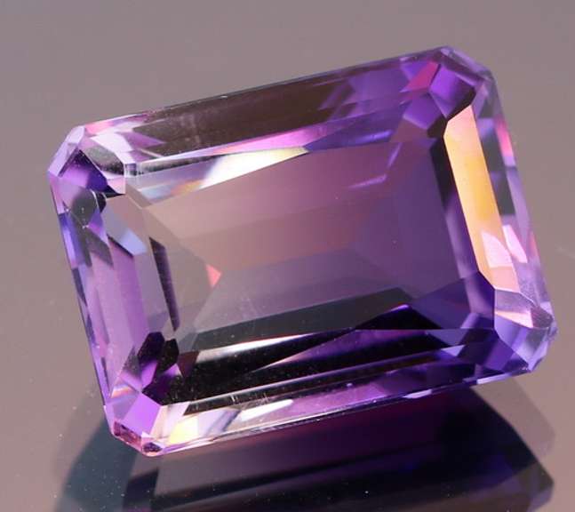 Beautiful 19.49ct top color created Ametrine