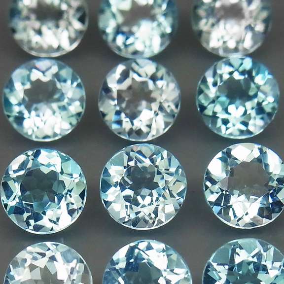 High fire collection of 12.21ct Topaz solitaires