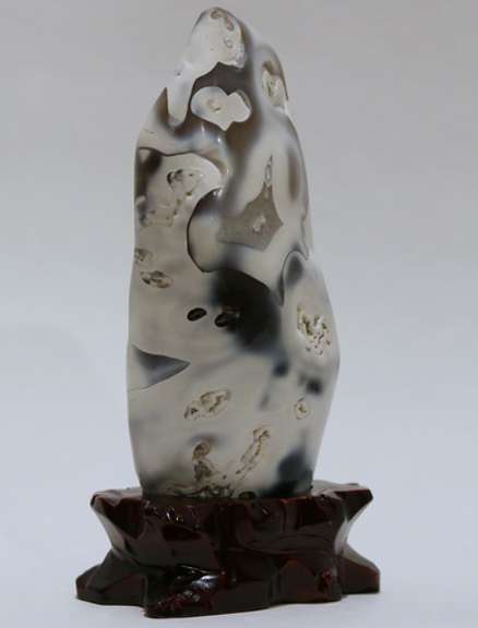 Impressive 7,135ct free form flower Jasper with stand