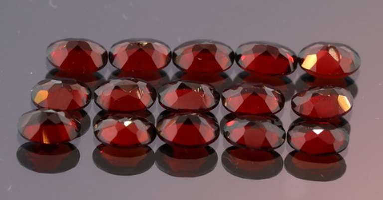 Incredible 13.59ct open color VS Garnet set