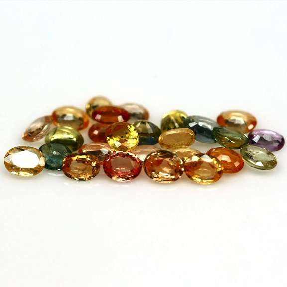 Glittering 6.73ct fancy color Sapphire set