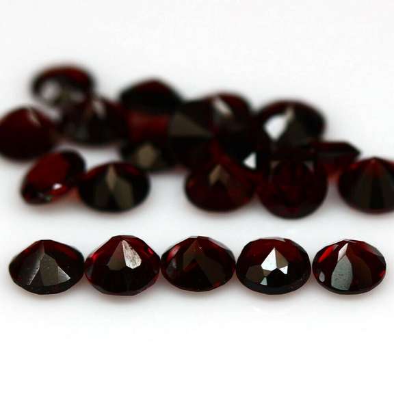 Rich round cut 8.86ct Garnet set