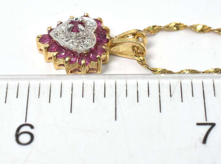 Charming Ruby & Diamond Necklace in Yellow Gold