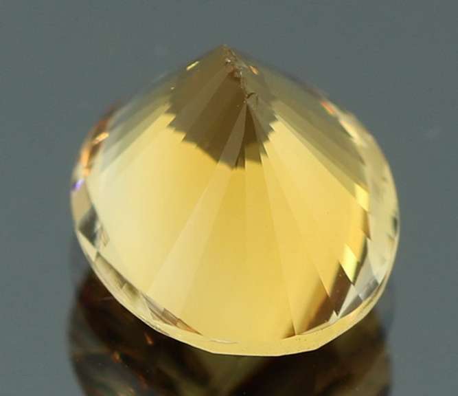 Vibrant 3.38ct 9x11mm concave cut Citrine