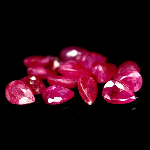 Heated only! 8.84ct violet red Ruby set