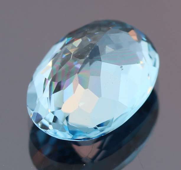 Brilliant 8.31ct oval cut Topaz center stone