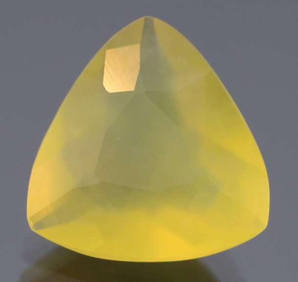 Captivating 4.61ct trillian cut golden Fire Opal