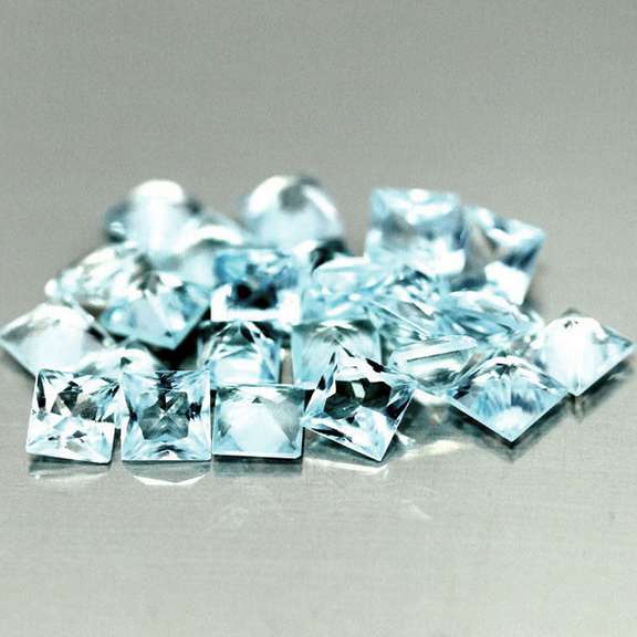 Amazing 4.81ct radiant cut ice blue Topaz set