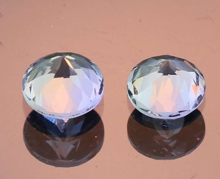 Glittering 1.46ct pair of silvery blue Tanzanite