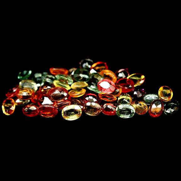 Heated only! 8.84ct fancy color Sapphire set