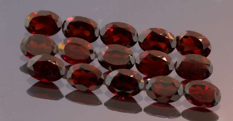 Incredible 13.59ct open color VS Garnet set
