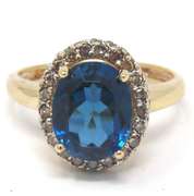Pretty London Blue Topaz & Chocolate Diamond Halo Ring