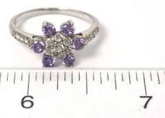 Sterling Silver Flower Ring With Purple and White Stones.