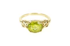 10K Yellow Gold Faceted Oval Peridot Scroll Filigree Ring