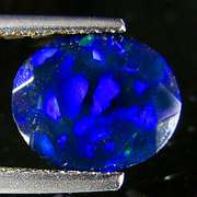 Silky black 1.44ct faceted Welo Black Opal