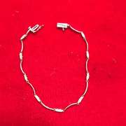 Ladies 10k white gold and diamond bracelet