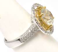 Striking 18KT 4.15CTW Yellow & White Diamond Ring