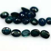 Heated only! 7.48ct deep blue sapphire set