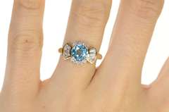 10K Yellow Gold Oval Blue Topaz Cubic Zirconia Halo Ring