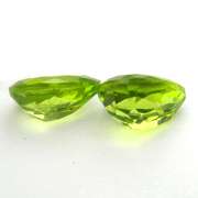 High grade 2.33ct matched Peridot set
