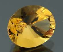 Vibrant 3.38ct 9x11mm concave cut Citrine