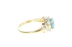 10K Yellow Gold Oval Blue Topaz Cubic Zirconia Halo Ring