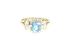 10K Yellow Gold Oval Blue Topaz Cubic Zirconia Halo Ring