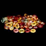 Glittering 7.90ct fancy color Sapphire set