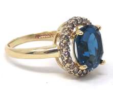 Pretty London Blue Topaz & Chocolate Diamond Halo Ring